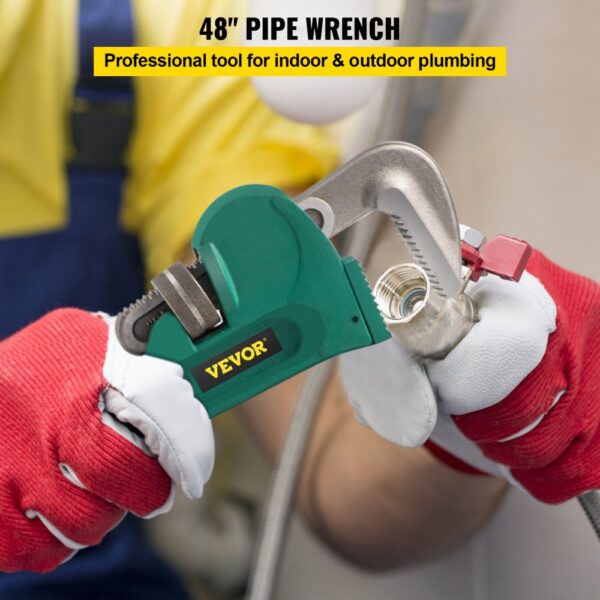 hands using VEVOR pipe wrench for plumbing work indoors.