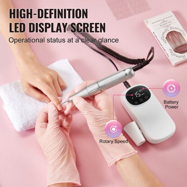 manicure using VEVOR nail drill with high-definition led display screen showing battery power and rotary speed.