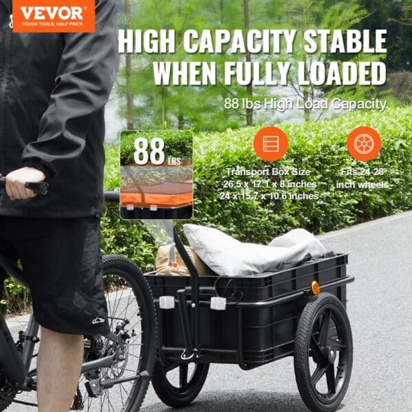 VEVOR bike cargo trailer transporting goods on a bike path, with an 88 lbs load capacity and storage box.