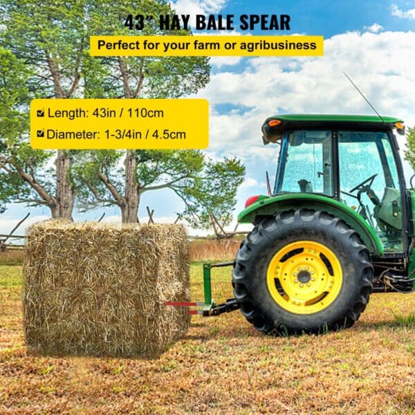 tractor using VEVOR hay spear to lift a hay bale in a farm field.