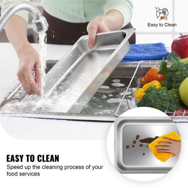 cleaning a VEVOR steam table pan under a faucet with vegetables on the side.