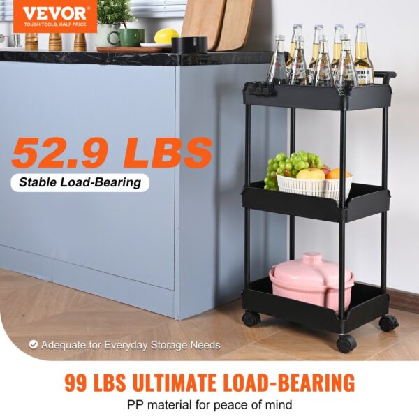 VEVOR 3-tier rolling utility cart holding bottles, fruits, and a pink pot in a kitchen.