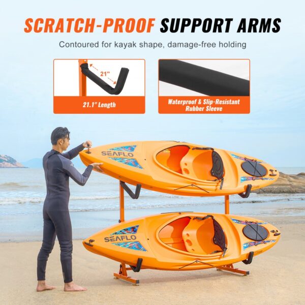 VEVOR kayak storage rack on a beach holding two orange kayaks with scratch-proof support arms.