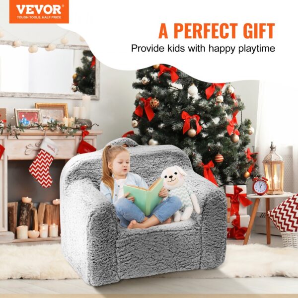 VEVOR kids armchair in a cozy christmas setting with a decorated tree, stockings, and candles.