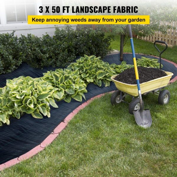 VEVOR weed barrier fabric in a garden, bordered by green plants and a wheelbarrow with mulch.