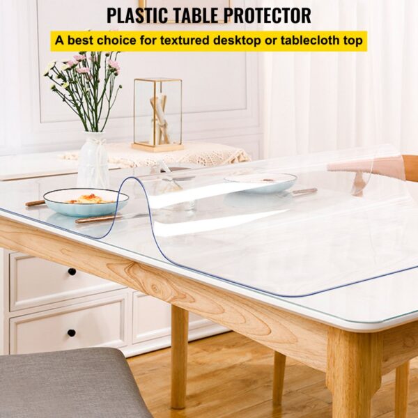 VEVOR plastic table cover protecting a dining table with flowers and dishes.