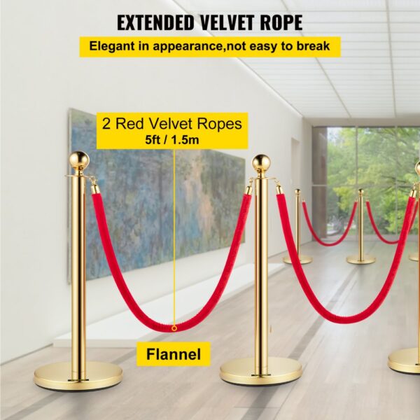 elegant gold VEVOR stanchion posts with red velvet ropes in a modern gallery setting.