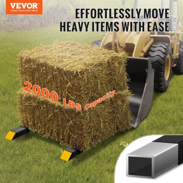 VEVOR pallet forks lifting hay bale on a tractor with 2000 lbs capacity in a grassy field.