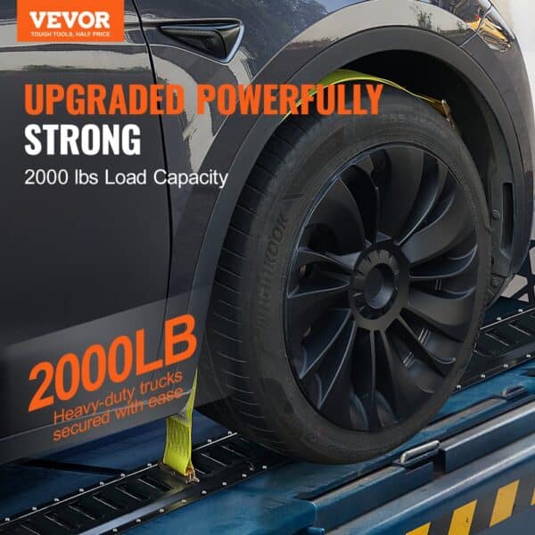 VEVOR e track tie-down kit securing 2000 lb load capacity, showcasing strong car wheel and strap.