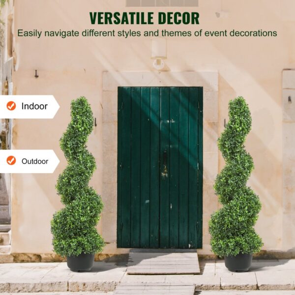 VEVOR artificial boxwood topiary spiral plants placed outside a green wooden door for indoor and outdoor decor.