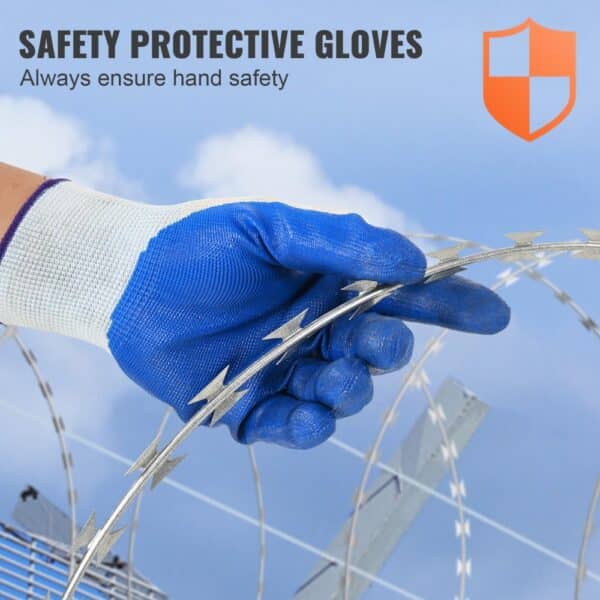 gloved hand handling sharp VEVOR razor wire fence with protective gloves against blue sky background.