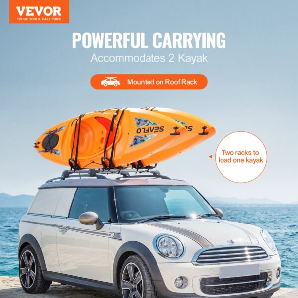 VEVOR kayak roof rack mounts two orange kayaks on a white mini cooper parked by the sea.