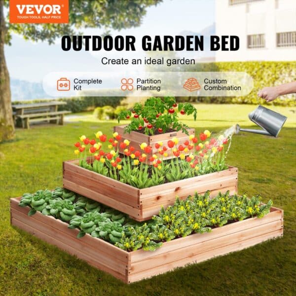 VEVOR raised garden bed with three-tier levels, blooming flowers, and vegetables being watered outdoors.