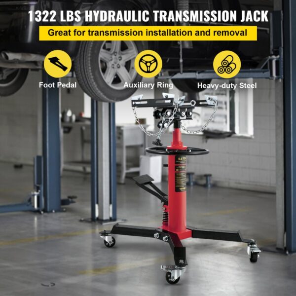 VEVOR transmission jack in a workshop, supporting 1322 lbs with foot pedal, auxiliary ring, and heavy-duty steel.