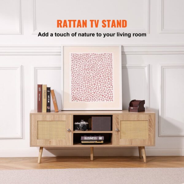 VEVOR rattan tv stand with art, books, and camera, enhancing a classic white-paneled living room.