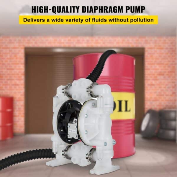 VEVOR air-operated double diaphragm pump with oil drum background in a warehouse.