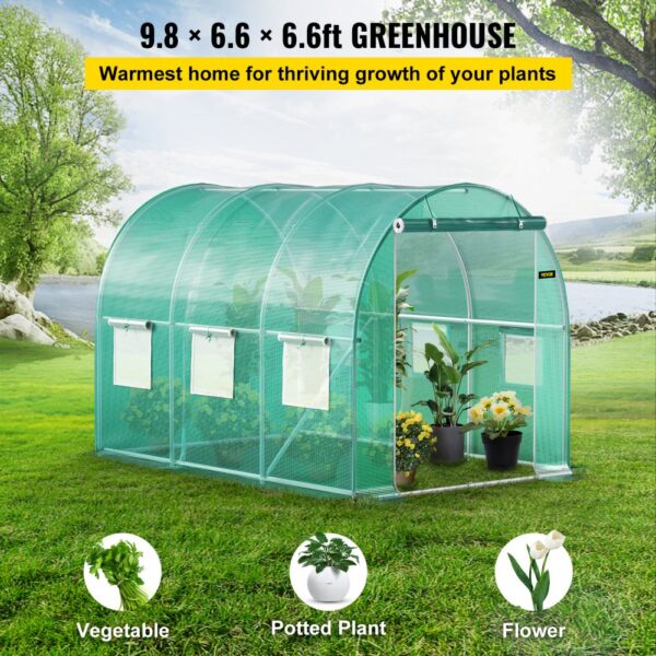 VEVOR walk-in greenhouse on a grassy lawn, ideal for vegetables, potted plants, and flowers.