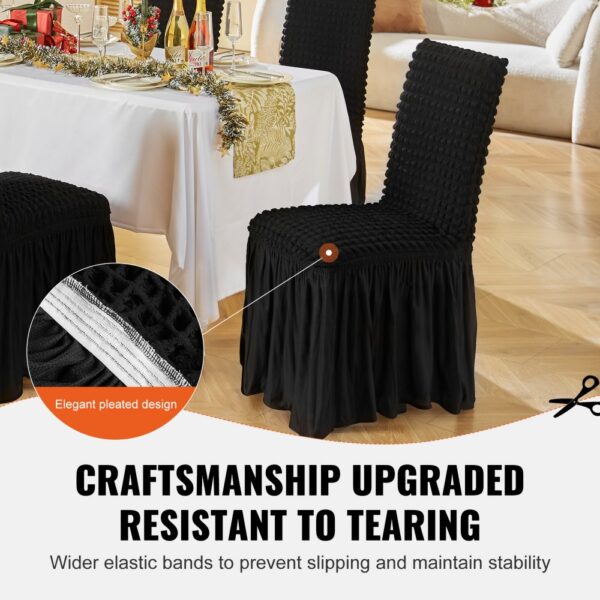 black VEVOR stretch spandex chair covers on dining room chairs, elegant pleated design, holiday table setting.