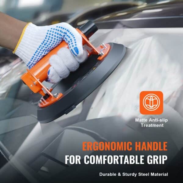 hand using VEVOR glass suction cup with ergonomic handle and anti-slip treatment for a comfortable grip.