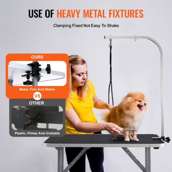 VEVOR pet grooming table with heavy metal fixtures, stable clamping, and a smiling dog being groomed.