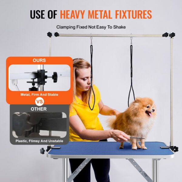 VEVOR pet grooming table with heavy metal fixtures and a sturdy frame, ensuring stability for pet grooming.