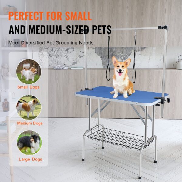 VEVOR pet grooming table for small and medium-sized pets, featuring a blue surface and metal frame.