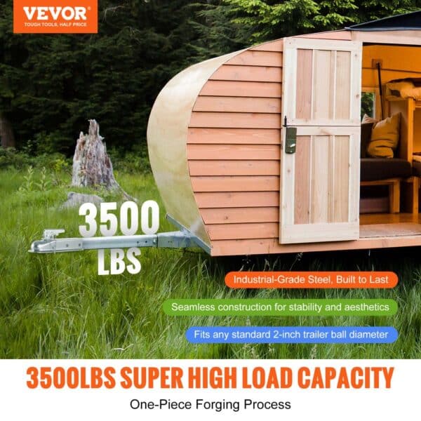 VEVOR trailer coupler with 3500lbs load capacity attached to a wooden trailer in a grassy field.