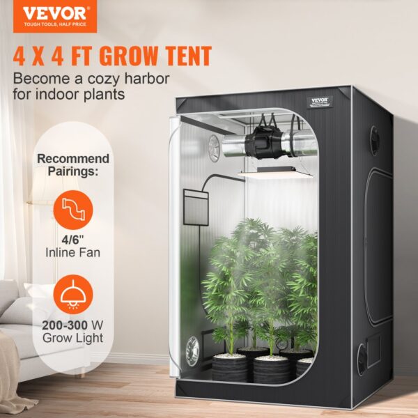 VEVOR grow tent 4x4 ft with plants, a grow light, and an inline fan for indoor gardening.