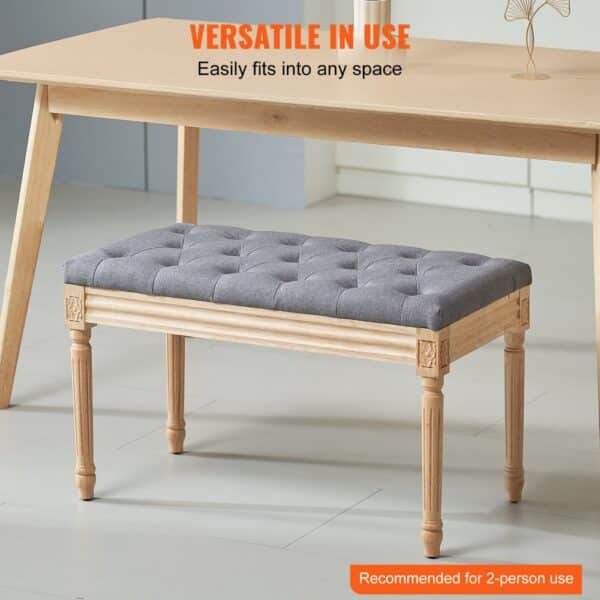 VEVOR upholstered bench with tufted gray cushion and wooden frame under a rectangular wooden table.