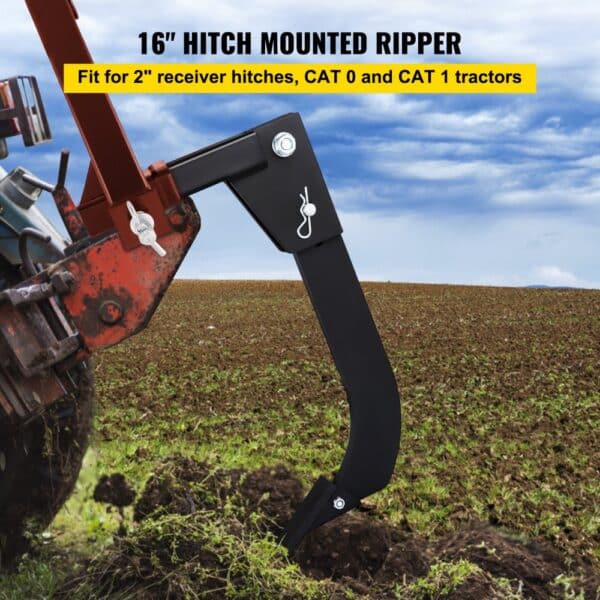 VEVOR hitch mounted ripper on tractor in field with clear sky background.