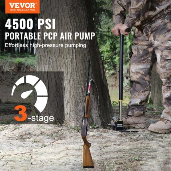 VEVOR high pressure hand pump in use, inflating a pcp air rifle in a forest setting.