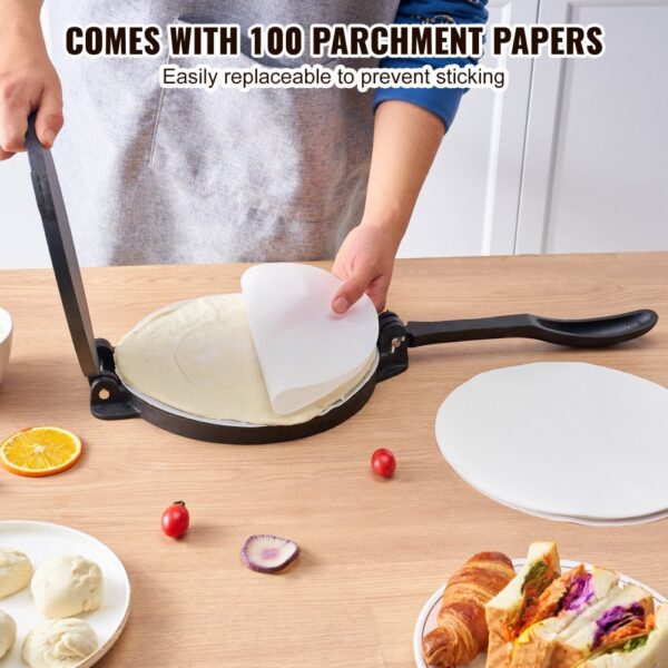 person using VEVOR tortilla press with parchment paper, surrounded by fresh ingredients on a wooden table.